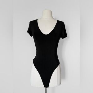 NWOT - ARITZIA Wilfred black short sleeve bodysuit, Size S. Pristine condition.